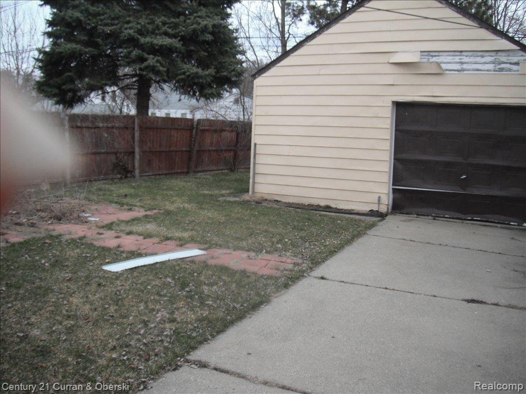 9240 Burt Road Detroit, MI 48228 - Photo 17 of 21 Garage and yard