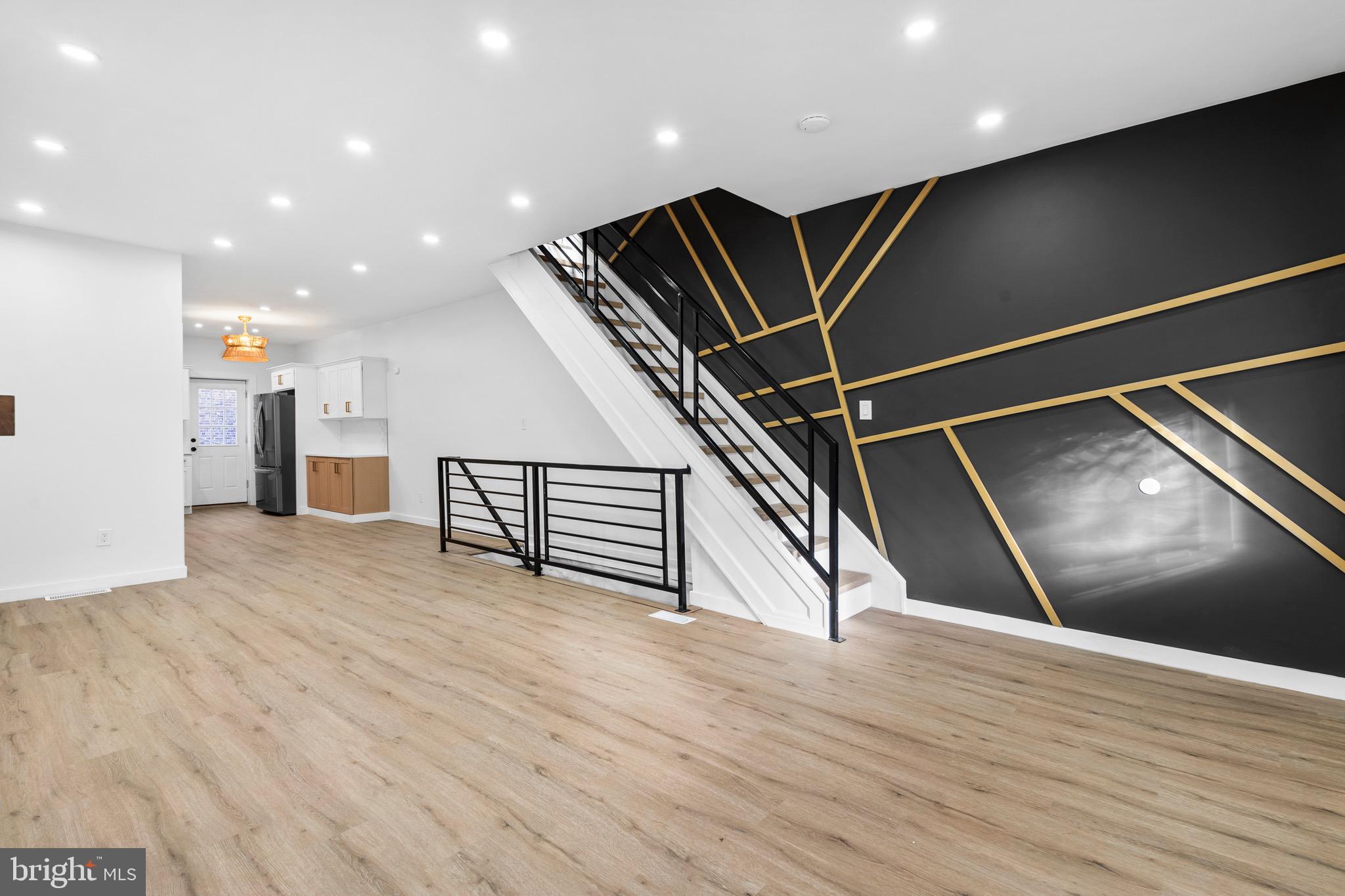 5541 Race Street Philadelphia, PA 19139 - Photo 2 of 37 a view of an empty room with wooden floor