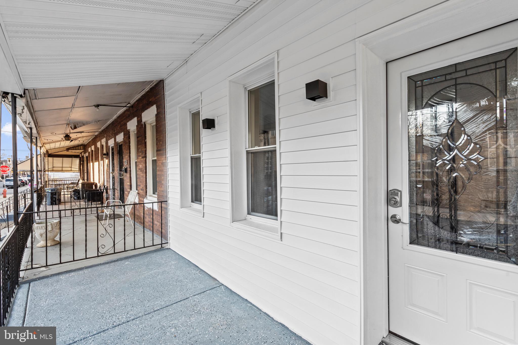 5541 Race Street Philadelphia, PA 19139 - Photo 26 of 37 a view of a porch door of the house