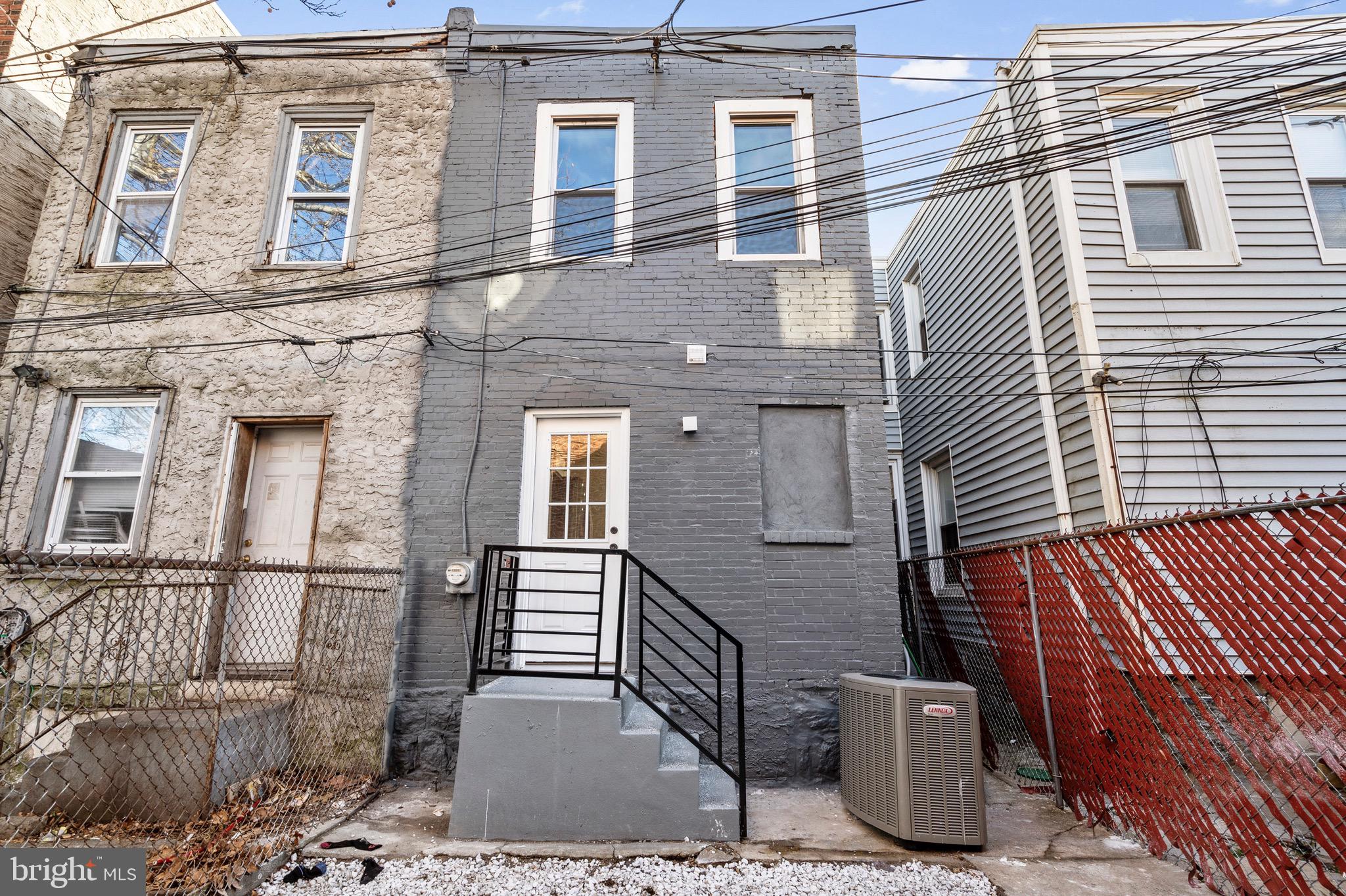 5541 Race Street Philadelphia, PA 19139 - Photo 27 of 37 a view of a brick house with many windows