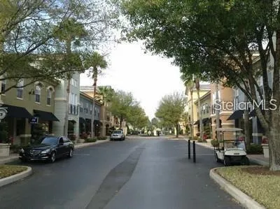 a view of street with parked cars