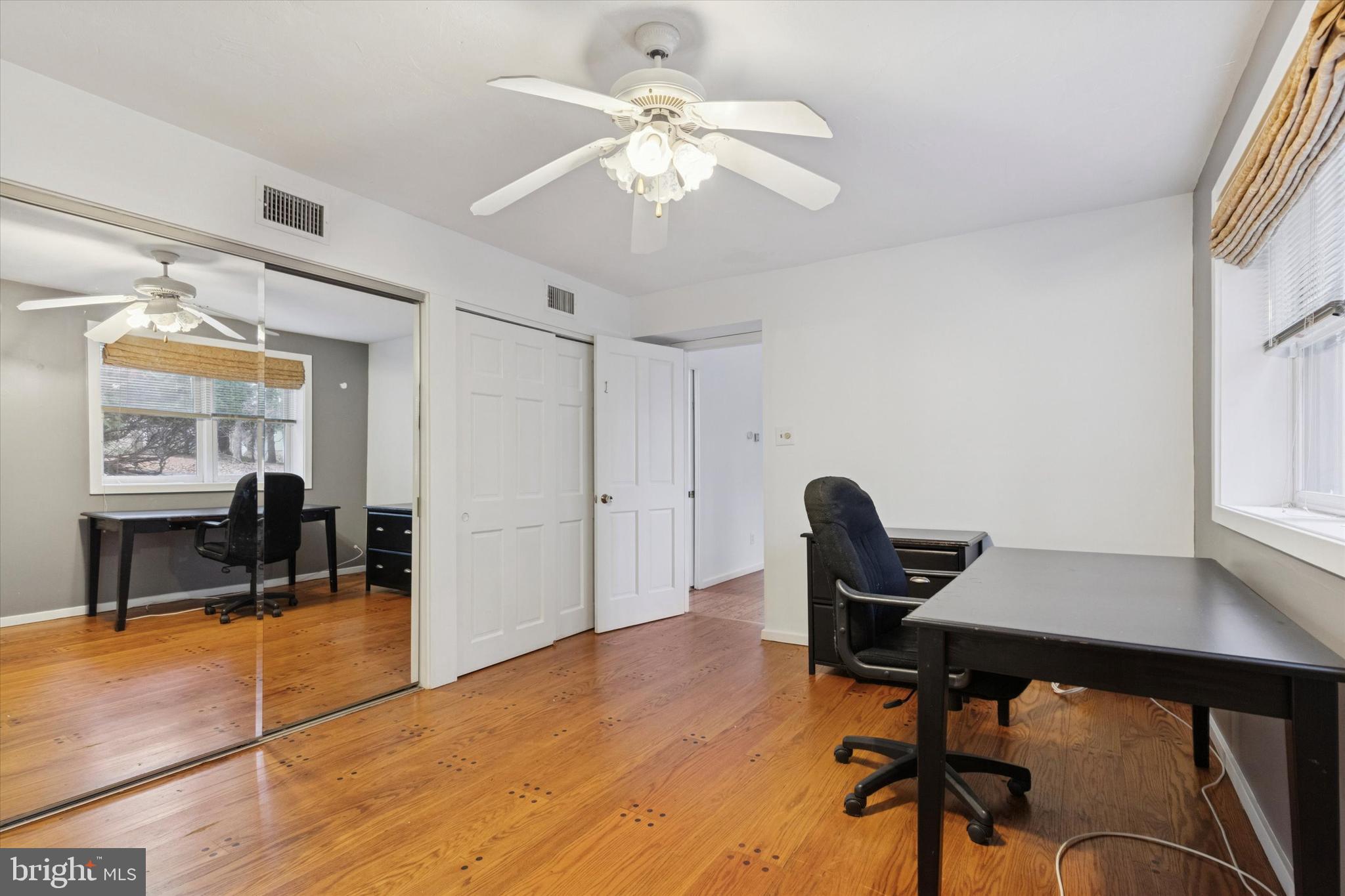 134 Yew Road Cheltenham, PA 19012 - Photo 12 of 19 a workspace with wooden floor and a window