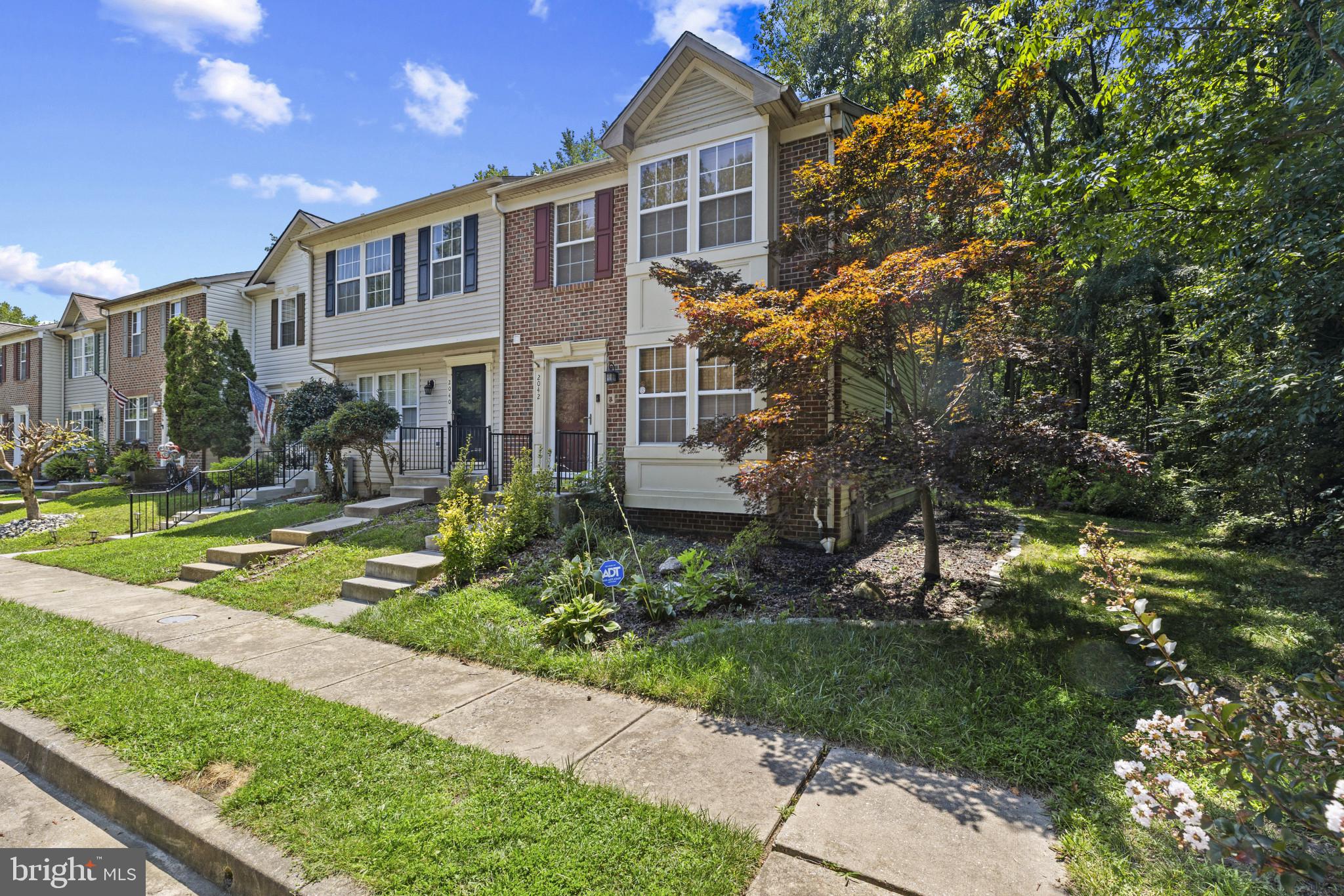 2042 Hackberry Road Baltimore, MD 21221 - Photo 1 of 26 a front view of a house with a yard