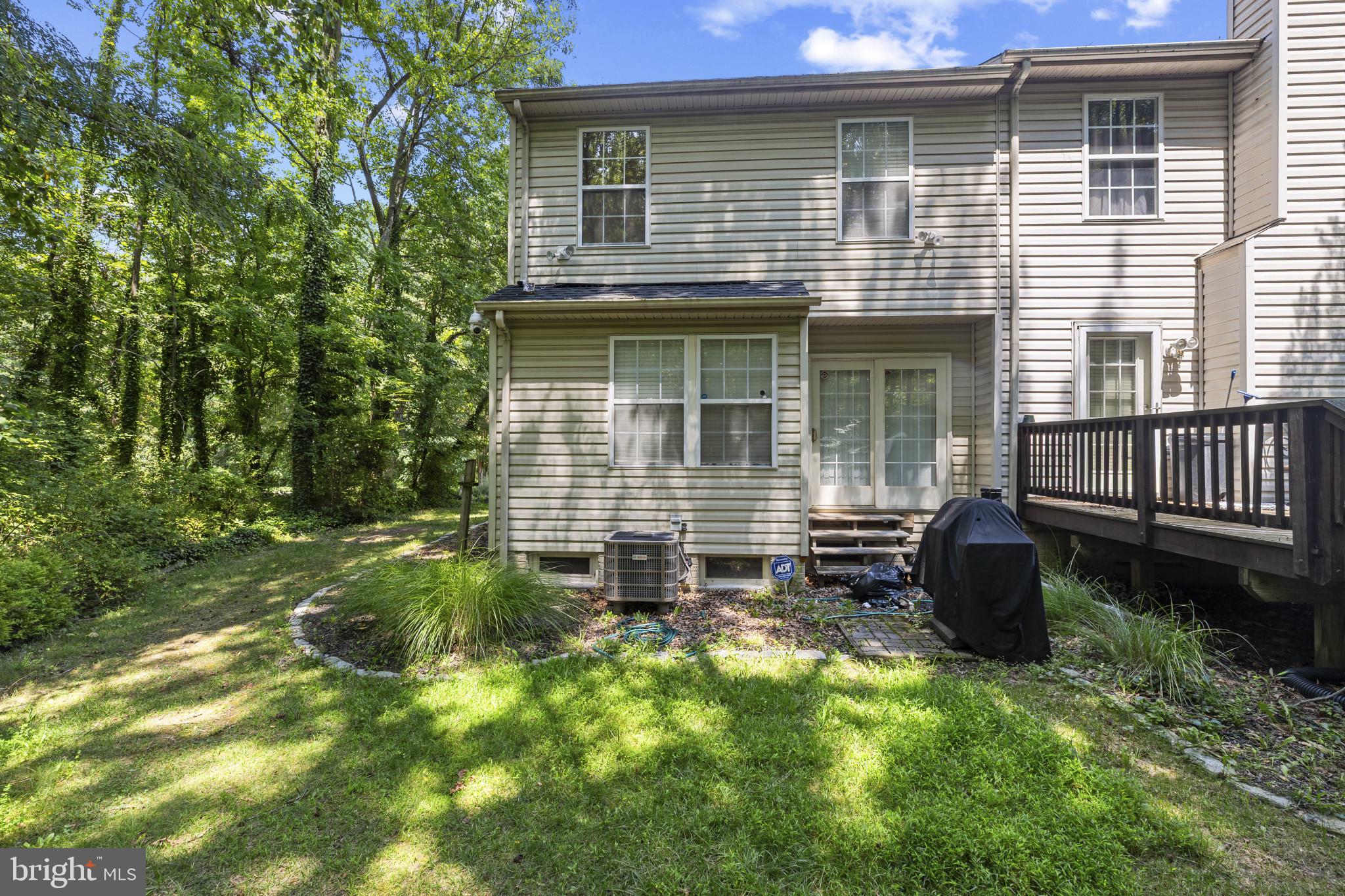 2042 Hackberry Road Baltimore, MD 21221 - Photo 25 of 26 a front view of a house with a garden