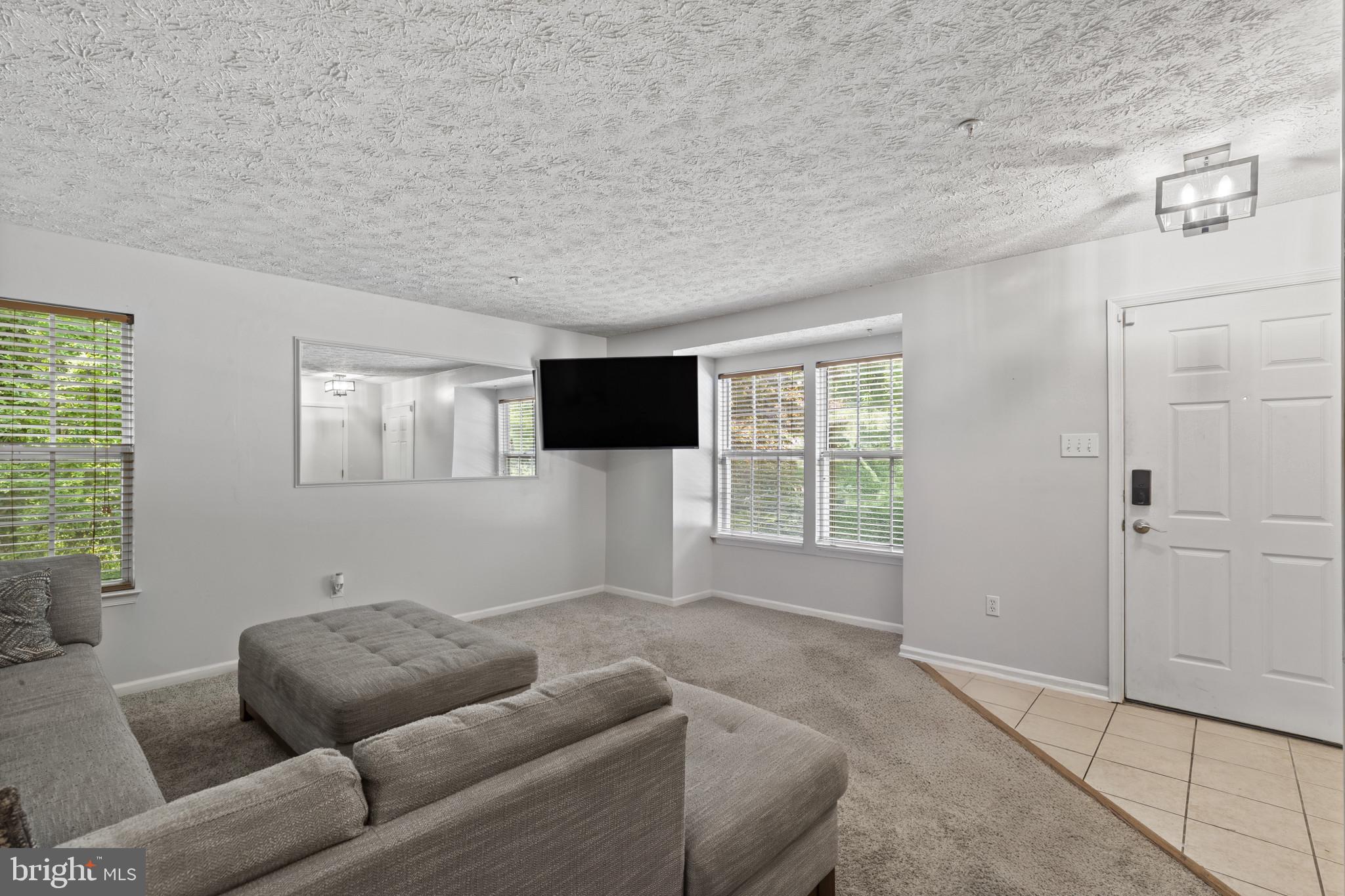 2042 Hackberry Road Baltimore, MD 21221 - Photo 5 of 26 a living room with furniture and a window