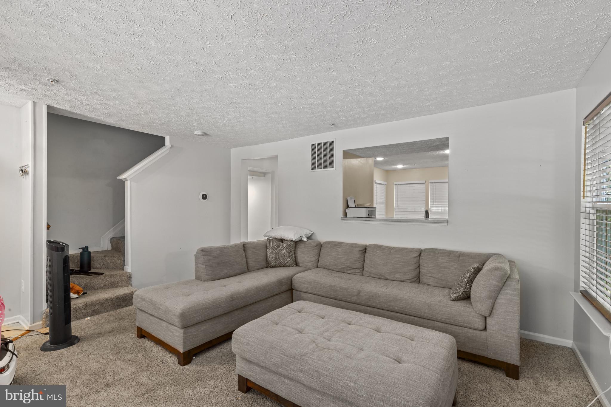 2042 Hackberry Road Baltimore, MD 21221 - Photo 7 of 26 a living room with furniture and a couch