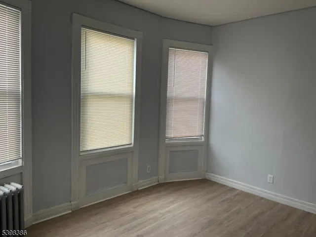 an empty room with window