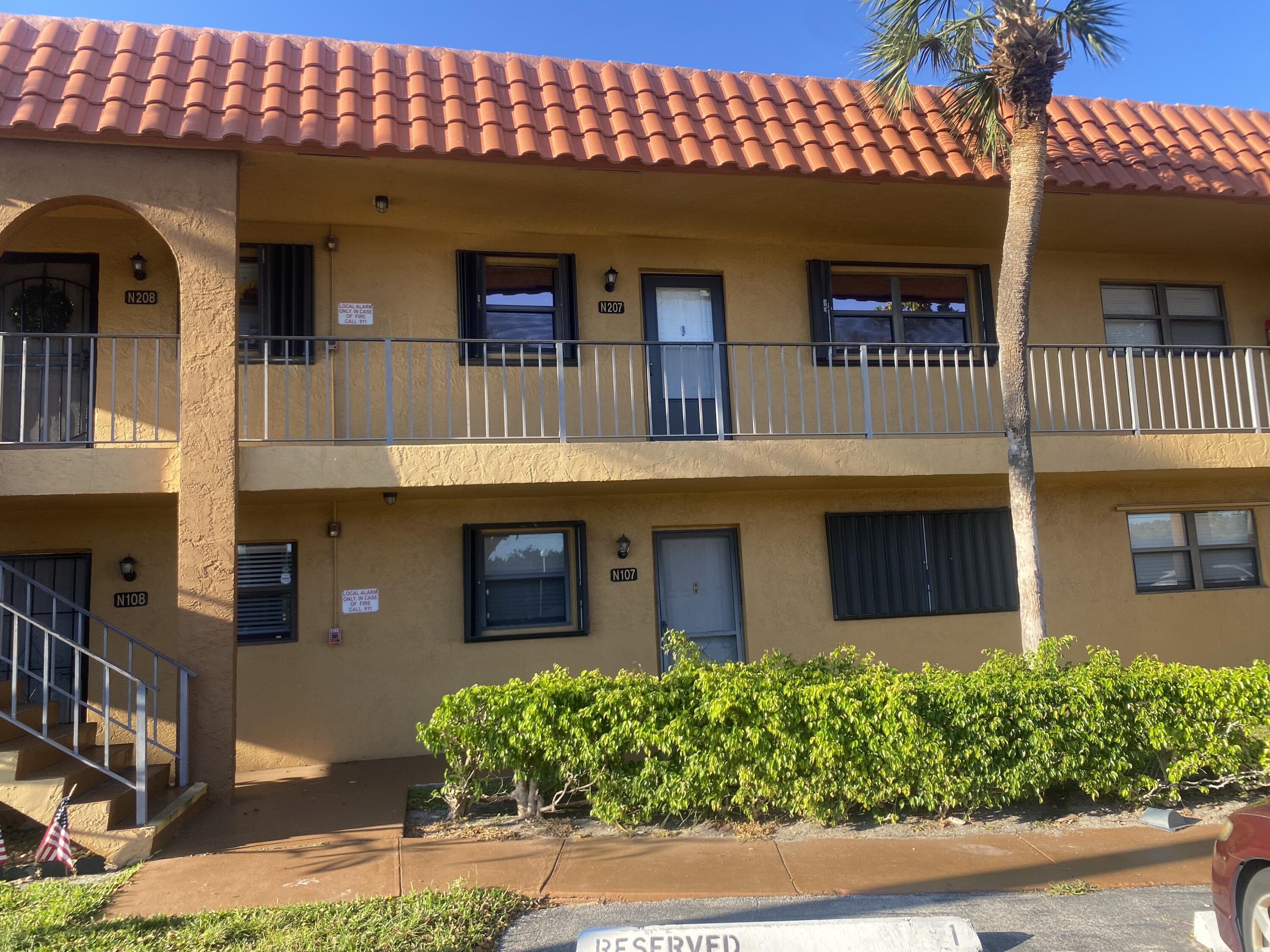 2181 Woolbright Road, Unit N201 Boynton Beach, FL 33426 - Photo 15 of 15 a front view of a house