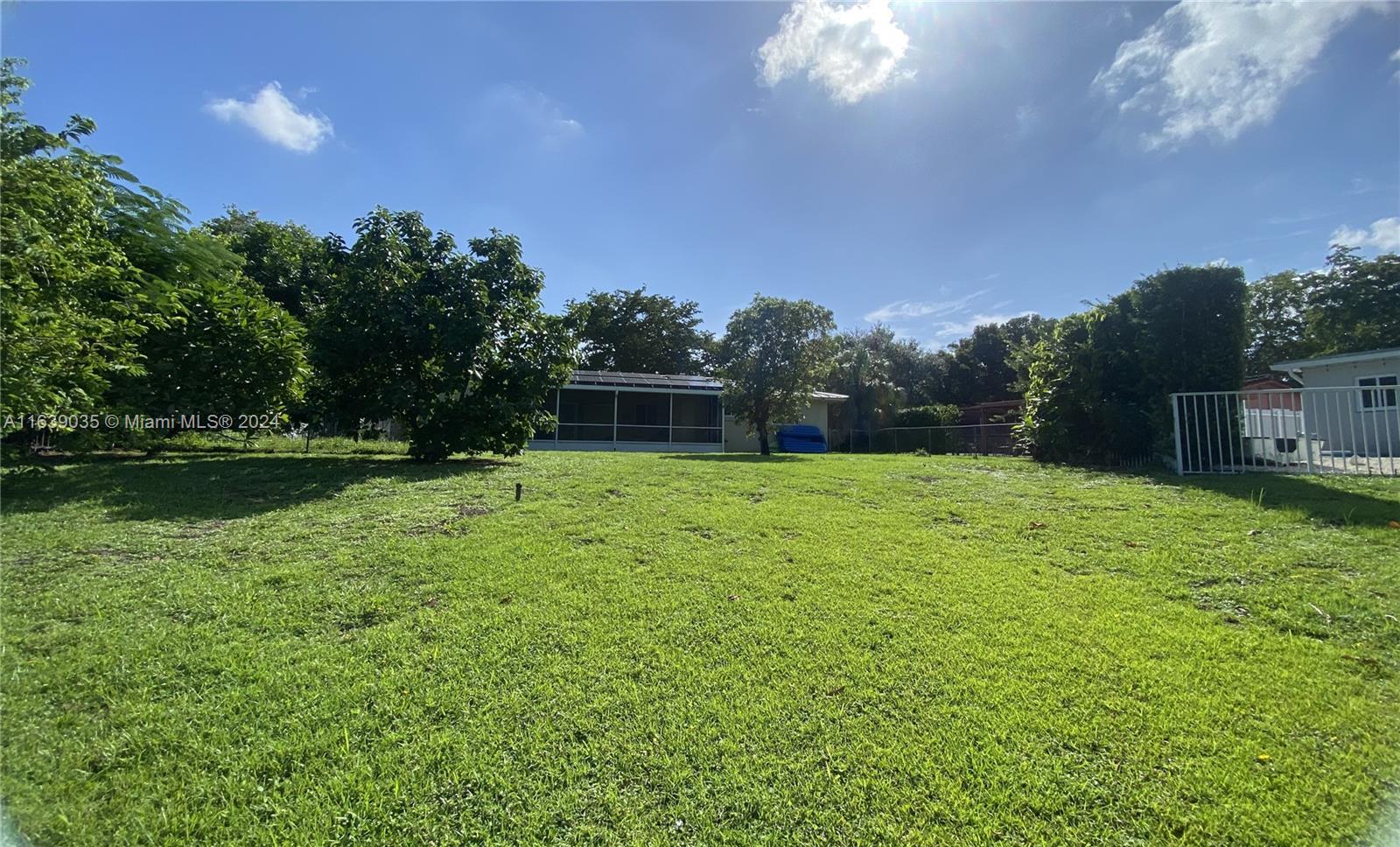 14550 English Road Miami Lakes, FL 33014 - Photo 29 of 33 Backyard view from the lake