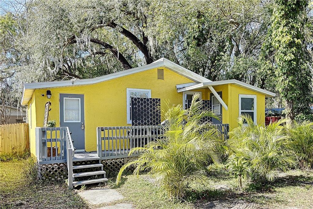 5721 Casson Avenue New Port Richey, FL 34652 - Photo 1 of 1 a view of a house with a small yard