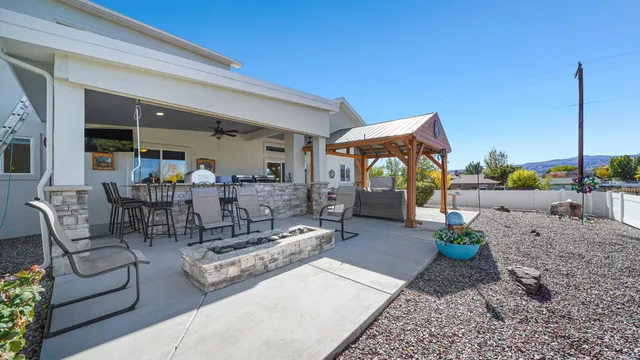 a view of a terrace with furniture and a potted plant