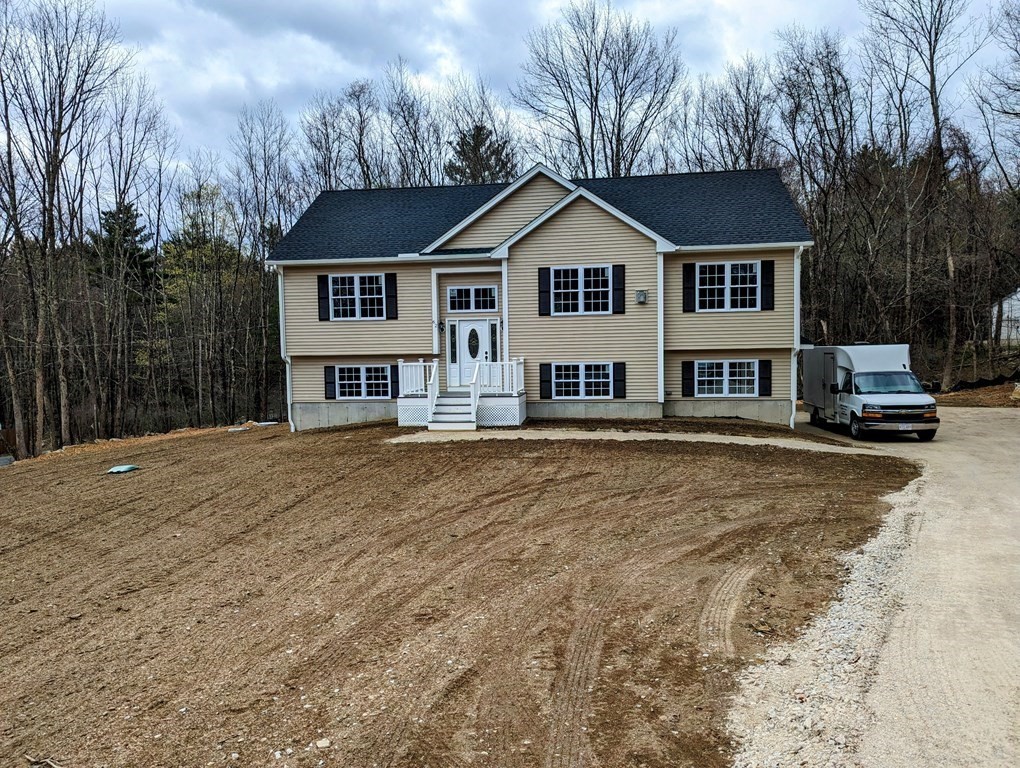 62 Colburn Road Charlton, MA 01507 - Photo 1 of 42 a front view of a house with a yard