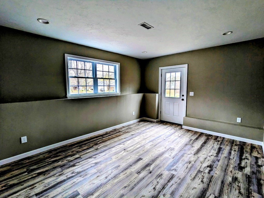 62 Colburn Road Charlton, MA 01507 - Photo 8 of 42 a view of an empty room with a window