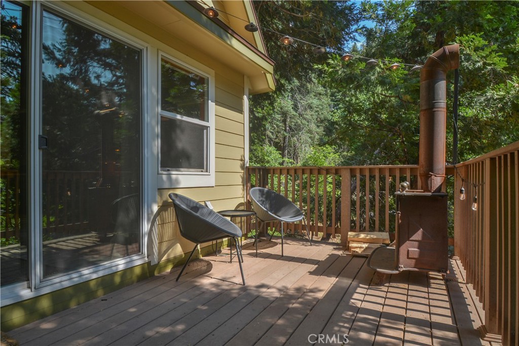 761 Arrowhead Villa Road Lake Arrowhead, CA 92352 - Photo 13 of 31 a view of a balcony with chairs