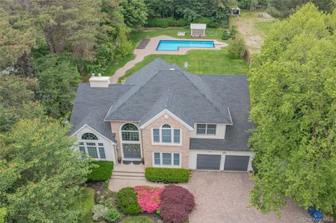 a house view with a garden space