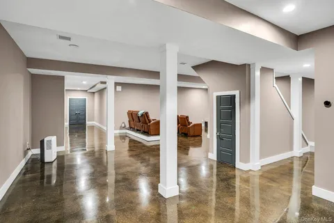 a view of a table and chairs on the roof deck