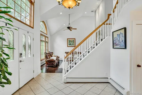 a view of entryway livingroom and hall