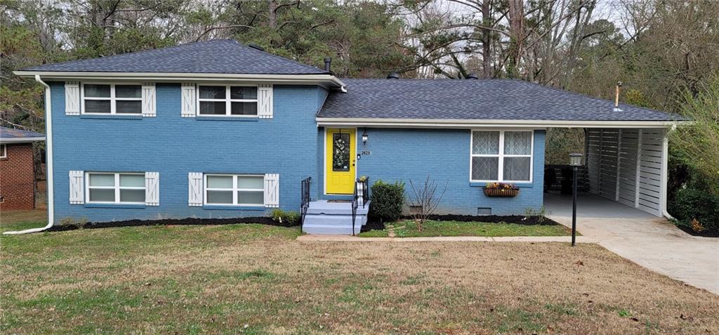 2428 Miriam Lane Decatur, GA 30032 - Photo 1 of 1 a front view of a house with a yard