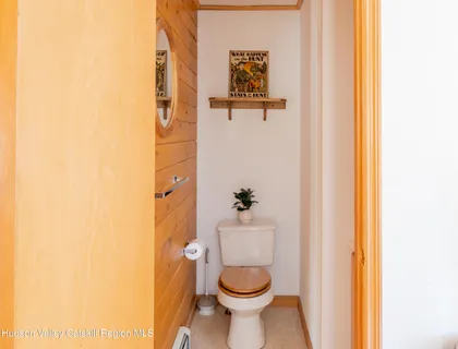 a bathroom with a toilet and a sink
