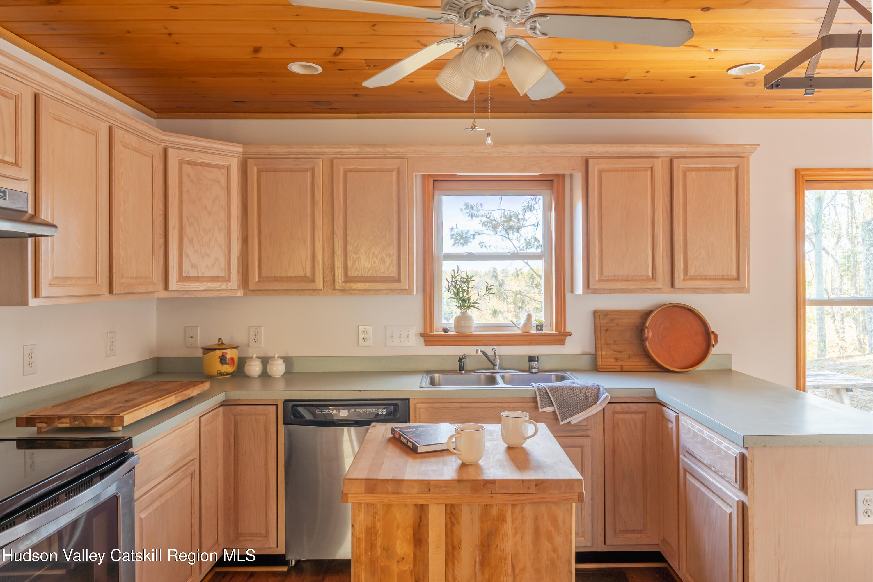 78 Ridge Way Catskill, NY 12414 - Photo 3 of 40 a kitchen with stainless steel appliances granite countertop a stove a sink and a microwave
