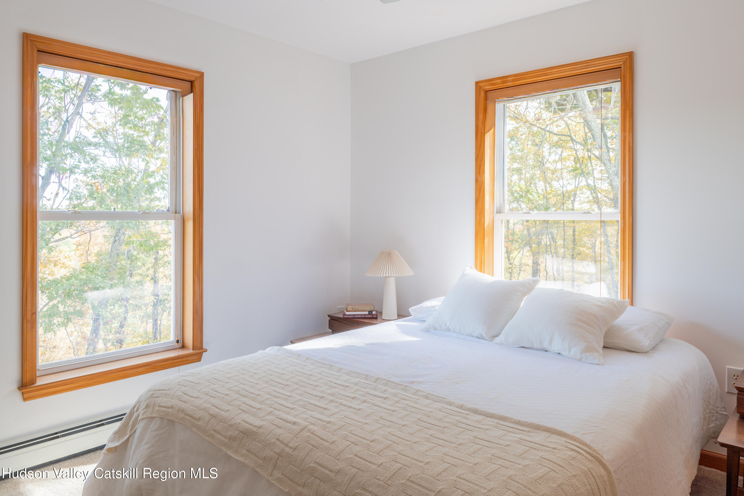 78 Ridge Way Catskill, NY 12414 - Photo 5 of 40 a bedroom with a bed and a window