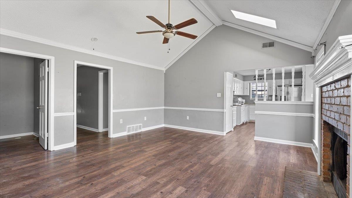 4032 Ross Road Memphis, TN 38115 - Photo 8 of 25 wooden floor in an empty room with a fireplace