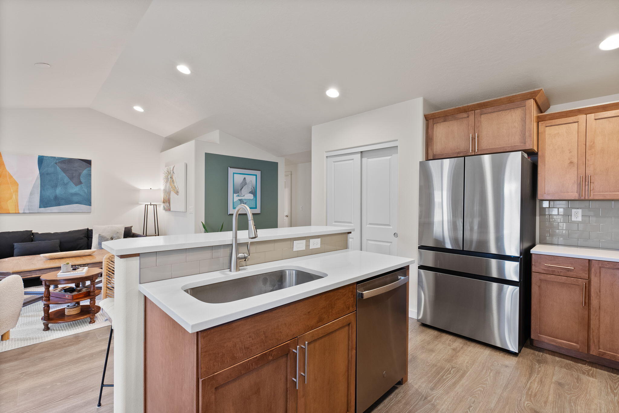 632 North Reed Street Sisters, OR 97759 - Photo 8 of 36 a kitchen with stainless steel appliances a sink and a refrigerator