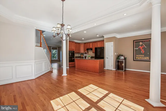 a living room with furniture fireplace and window