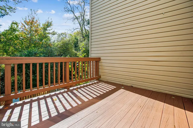 a white bath tub sitting next to a white sink