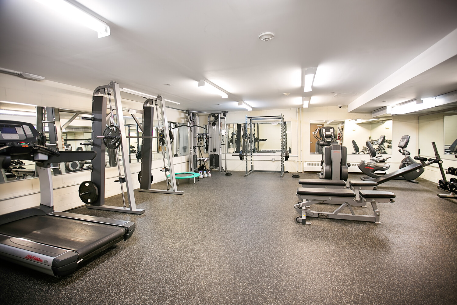 41-26 27th Street, Unit 3D Queens, NY 11101 - Photo 20 of 29 a room with gym equipment and a table