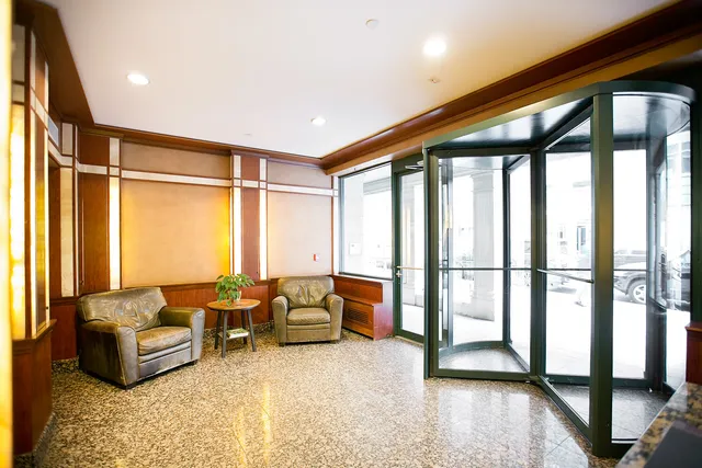 a room with gym equipment and a table