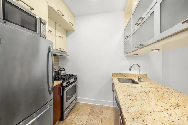 a view of kitchen island with wooden floor