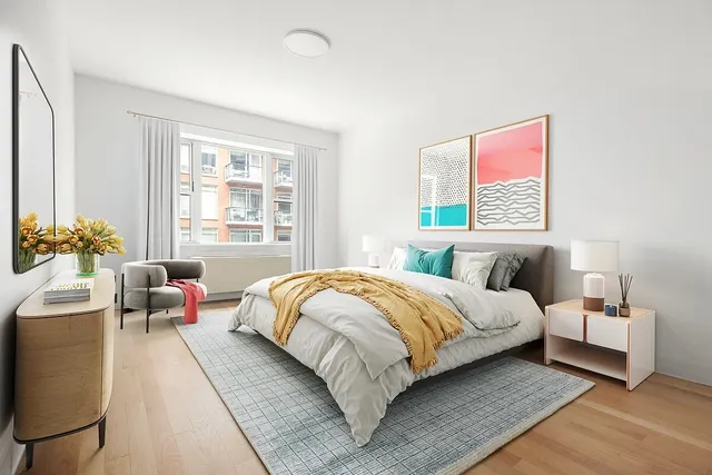 a kitchen with a sink a stove and cabinets