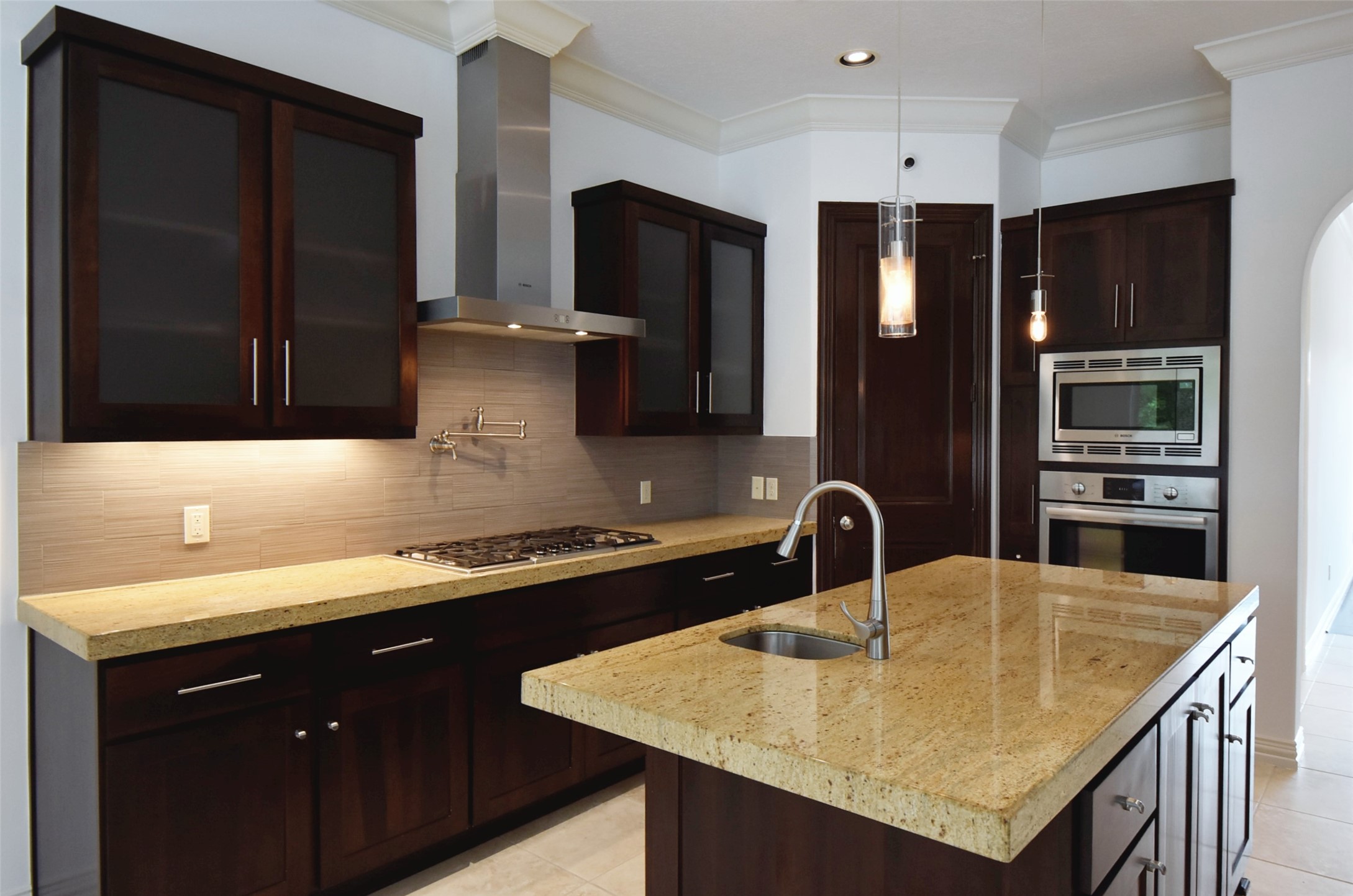 2014 Split Branch Court Houston, TX 77077 - Photo 9 of 47 a kitchen with stainless steel appliances granite countertop a sink and a refrigerator