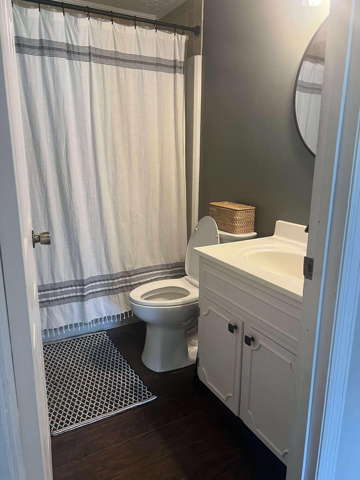 360 Rakes Road Rocky Mount, VA 24151 - Photo 11 of 32 a bathroom with a sink and a toilet