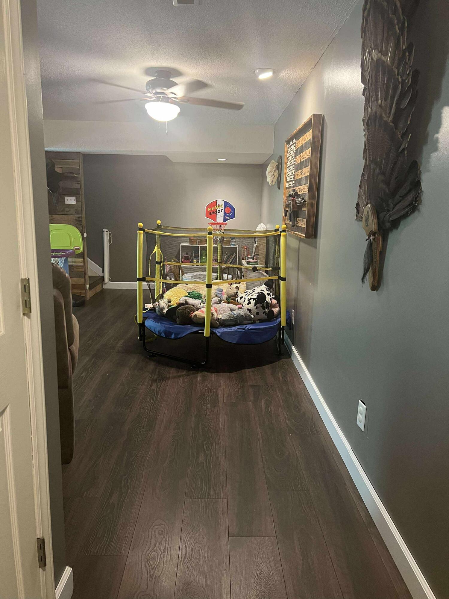 360 Rakes Road Rocky Mount, VA 24151 - Photo 20 of 32 a living room with furniture and a chandelier