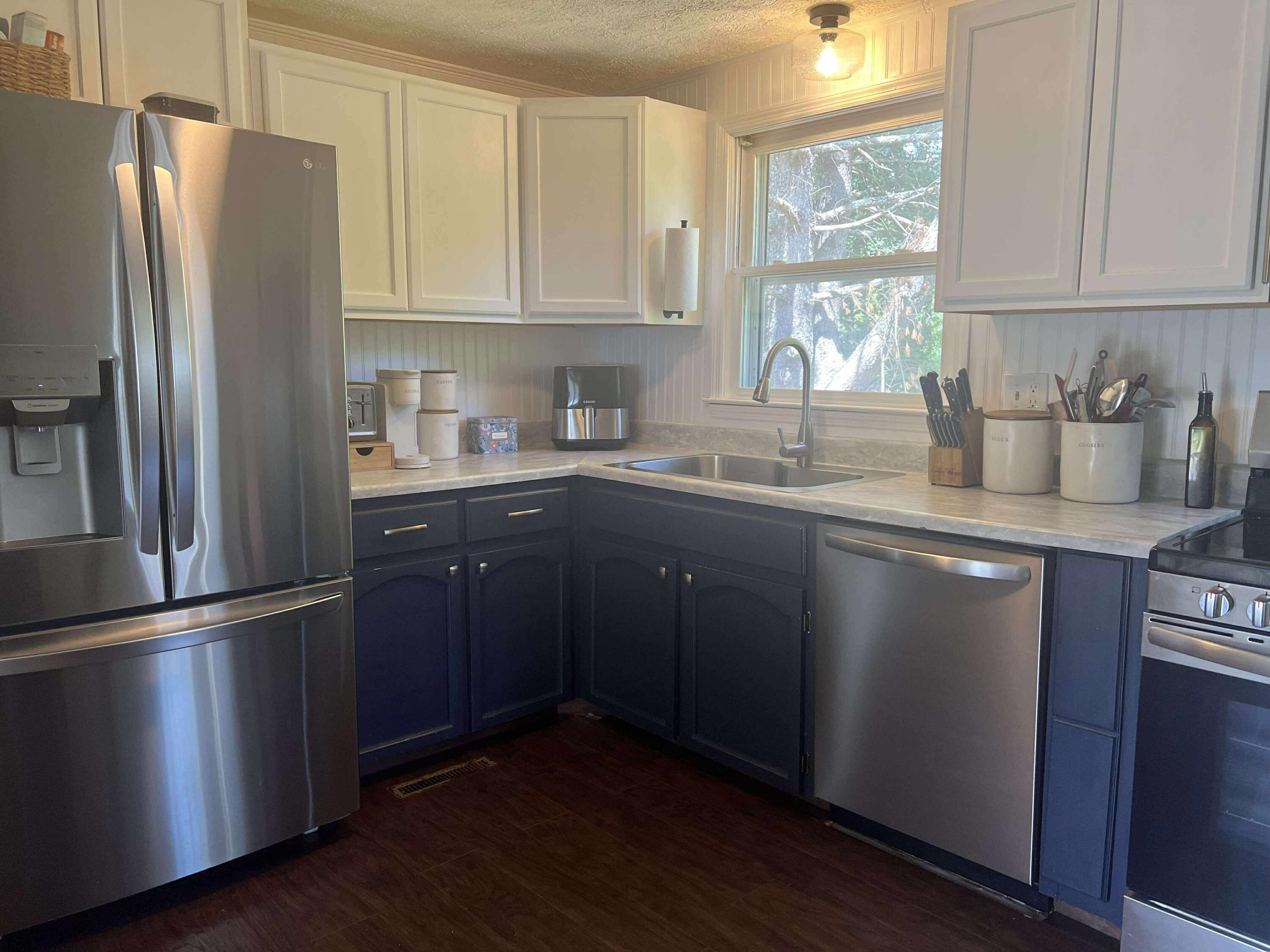 360 Rakes Road Rocky Mount, VA 24151 - Photo 3 of 32 a kitchen with granite countertop a refrigerator sink and cabinets