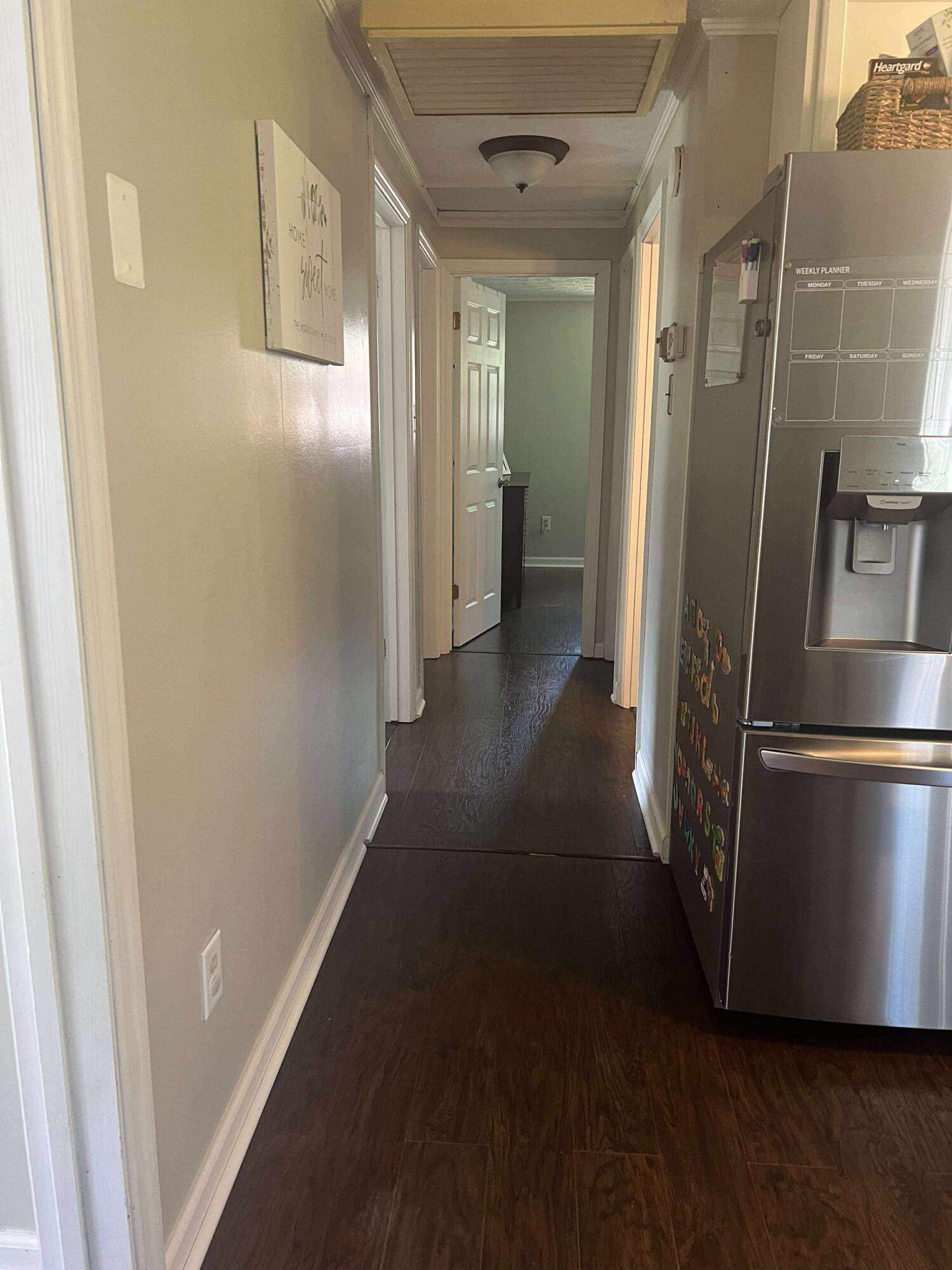 360 Rakes Road Rocky Mount, VA 24151 - Photo 10 of 32 a view of a hallway with wooden floor