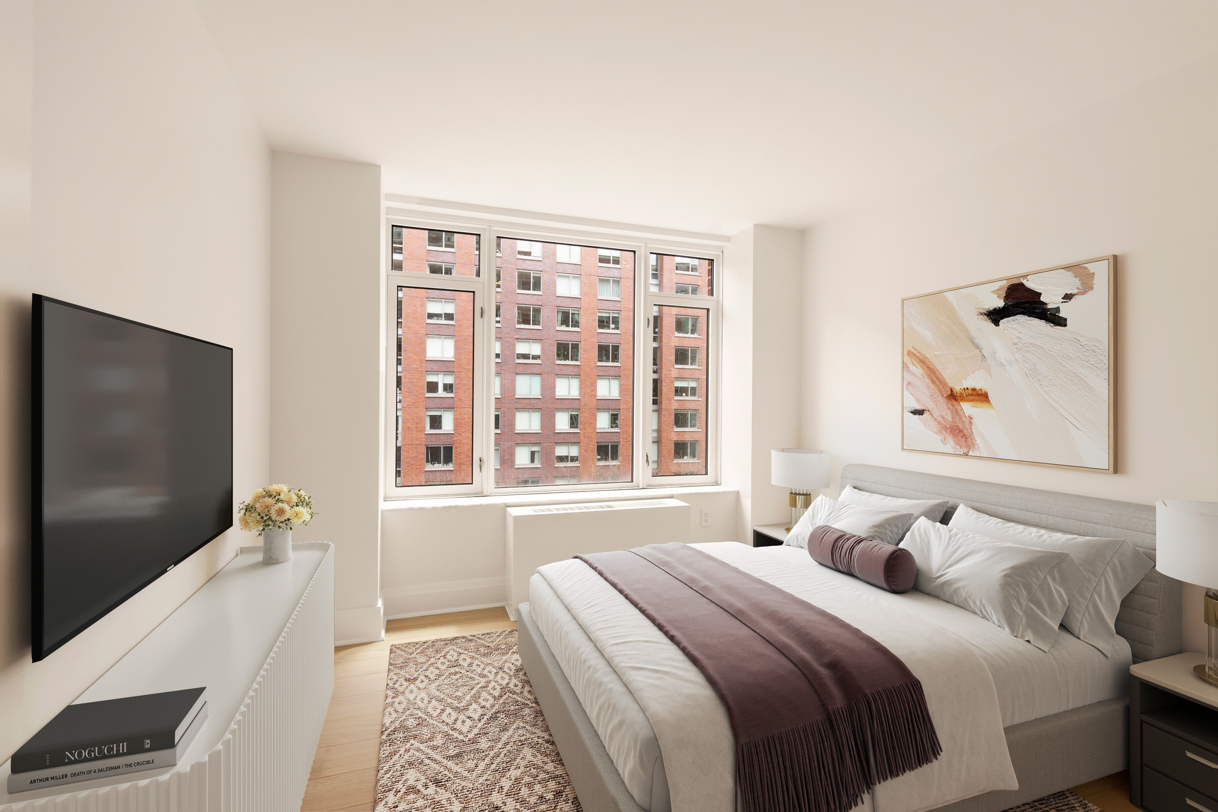 210 Warren Street, Unit 7A Manhattan, NY 10282 - Photo 8 of 9 a bedroom with a bed and a flat screen tv