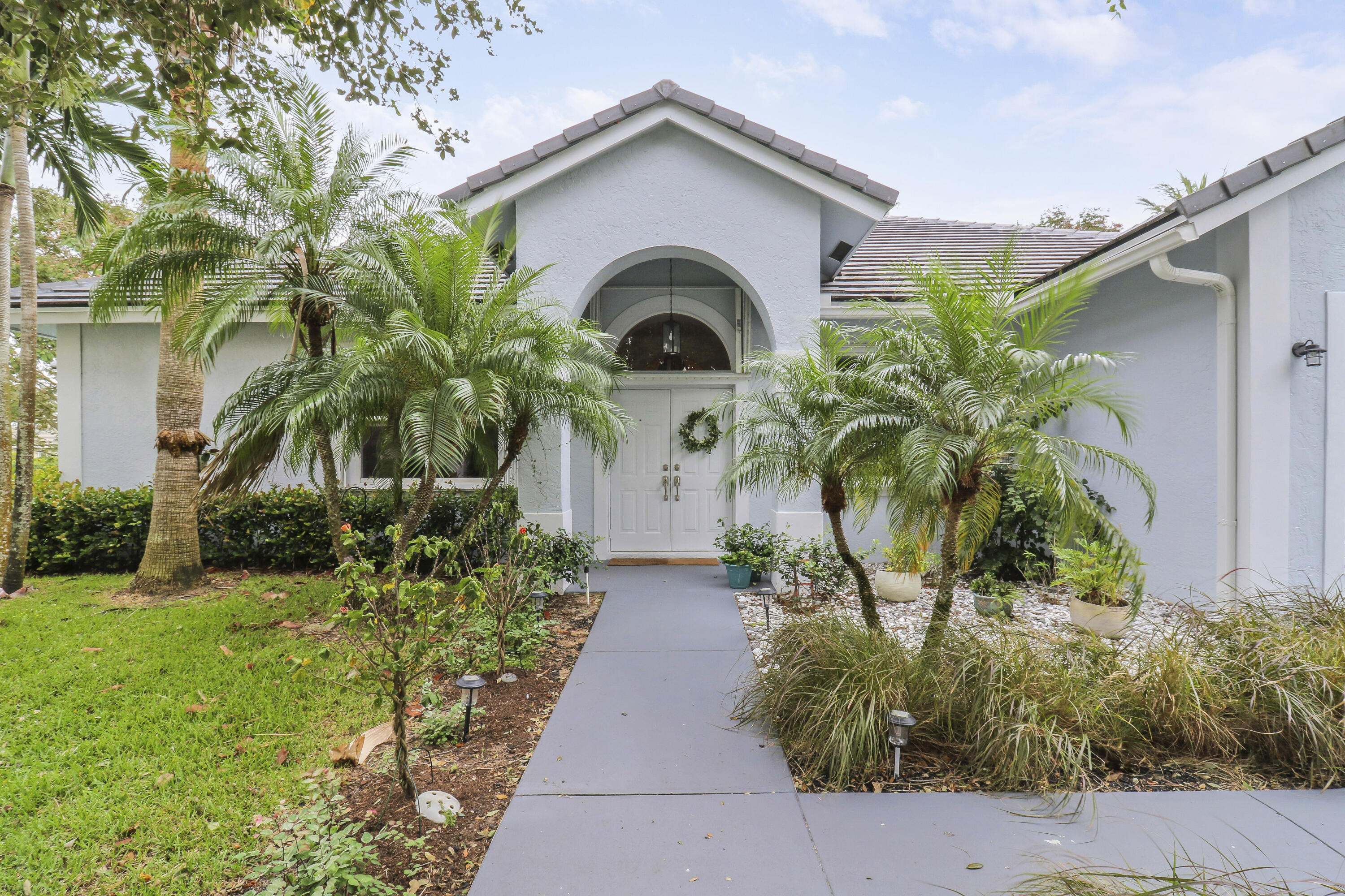 234 Sparrow Point Jupiter, FL 33458 - Photo 48 of 64 Exterior Entry