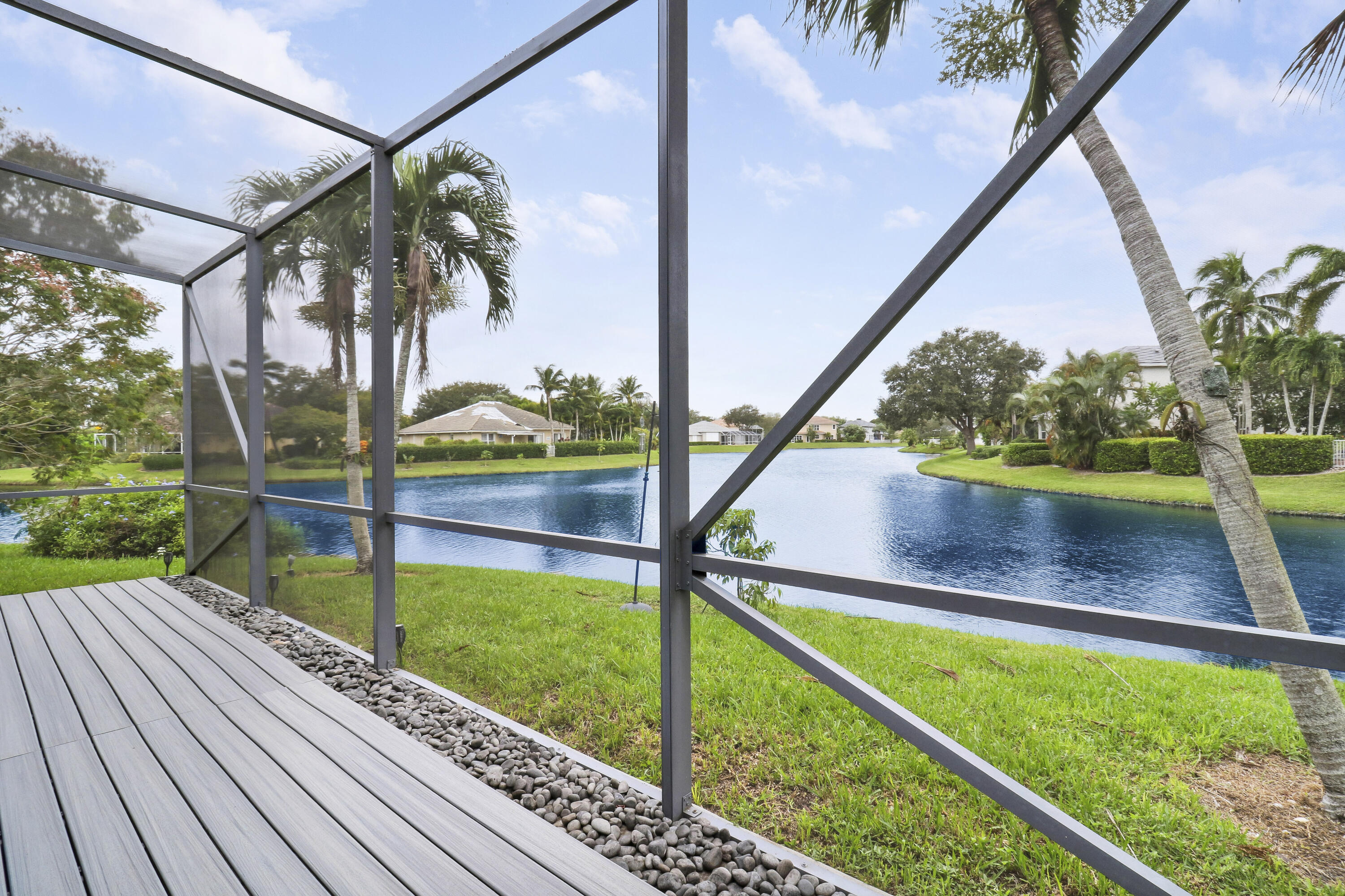 234 Sparrow Point Jupiter, FL 33458 - Photo 55 of 64 Extenden Patio and Lake View