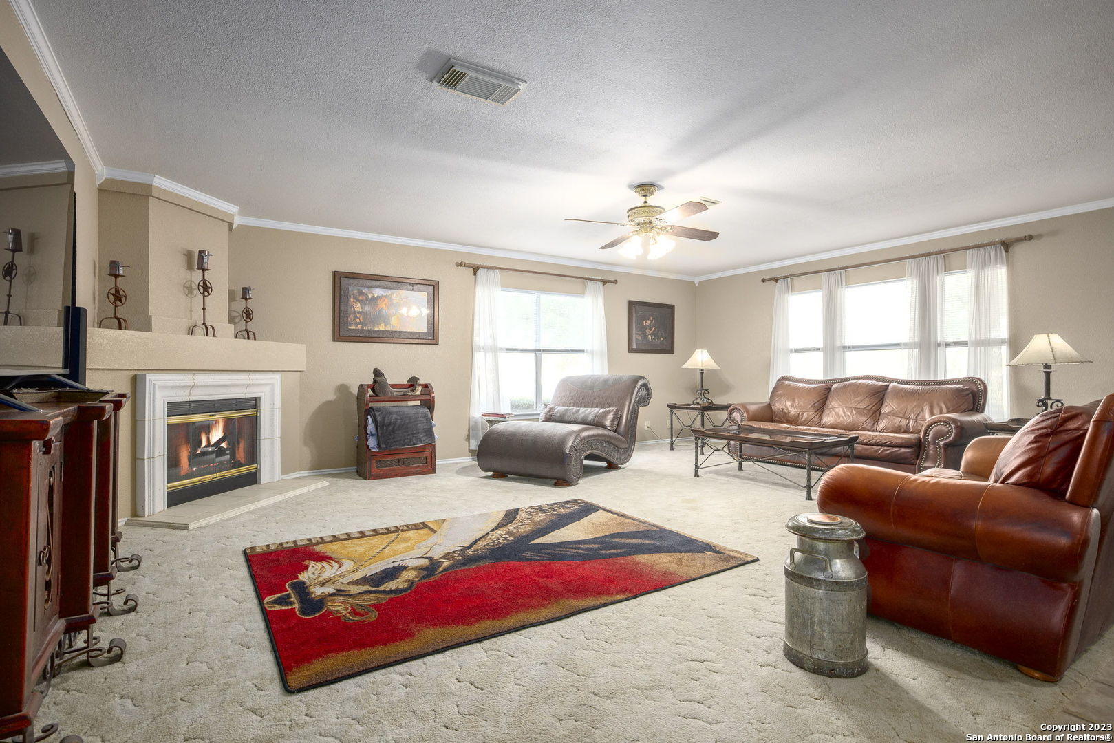 1940 Lower Seguin Road Marion, TX 78124 - Photo 12 of 49 a living room with furniture fireplace and flat screen tv
