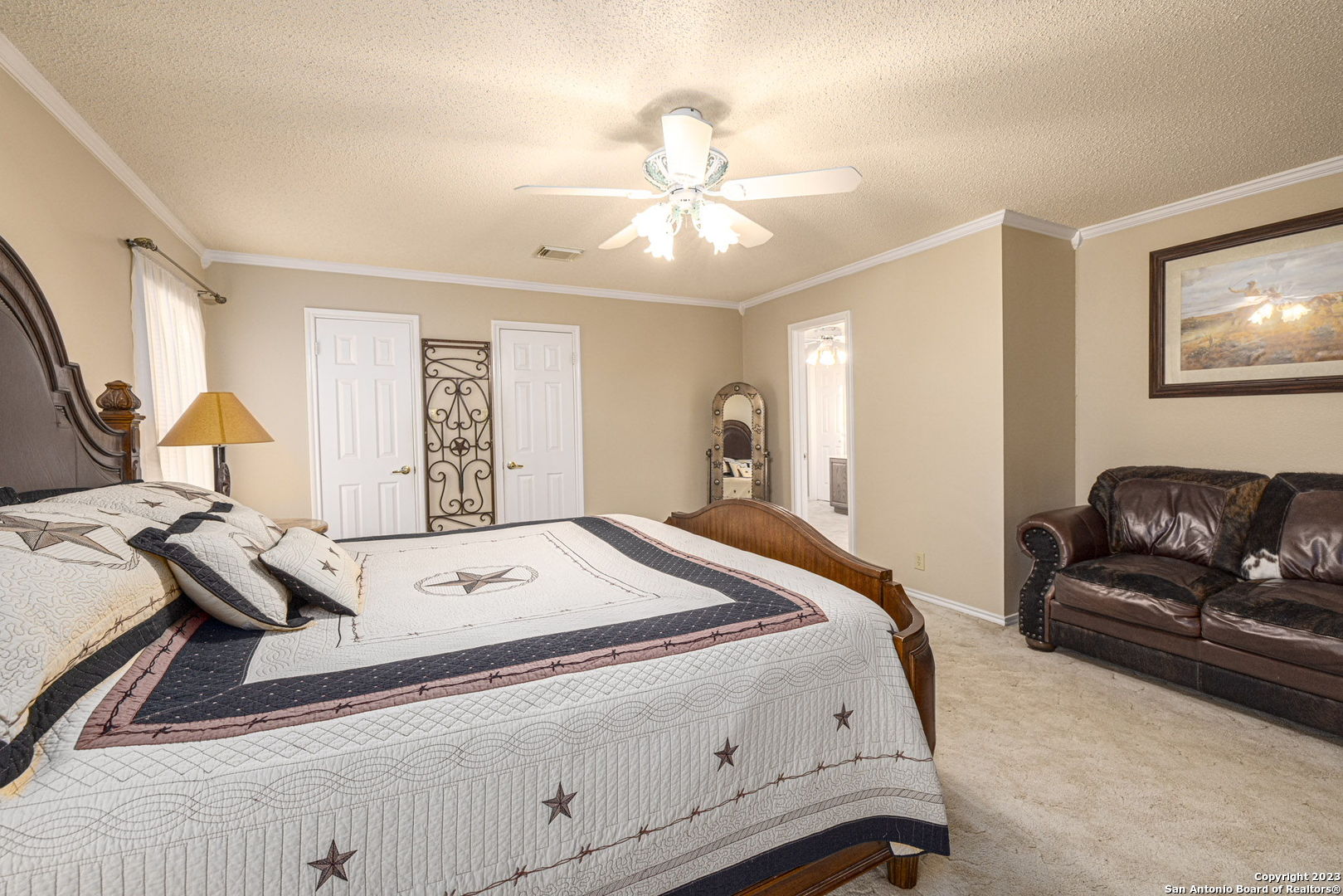 1940 Lower Seguin Road Marion, TX 78124 - Photo 19 of 49 a bed room with a bed and a couch