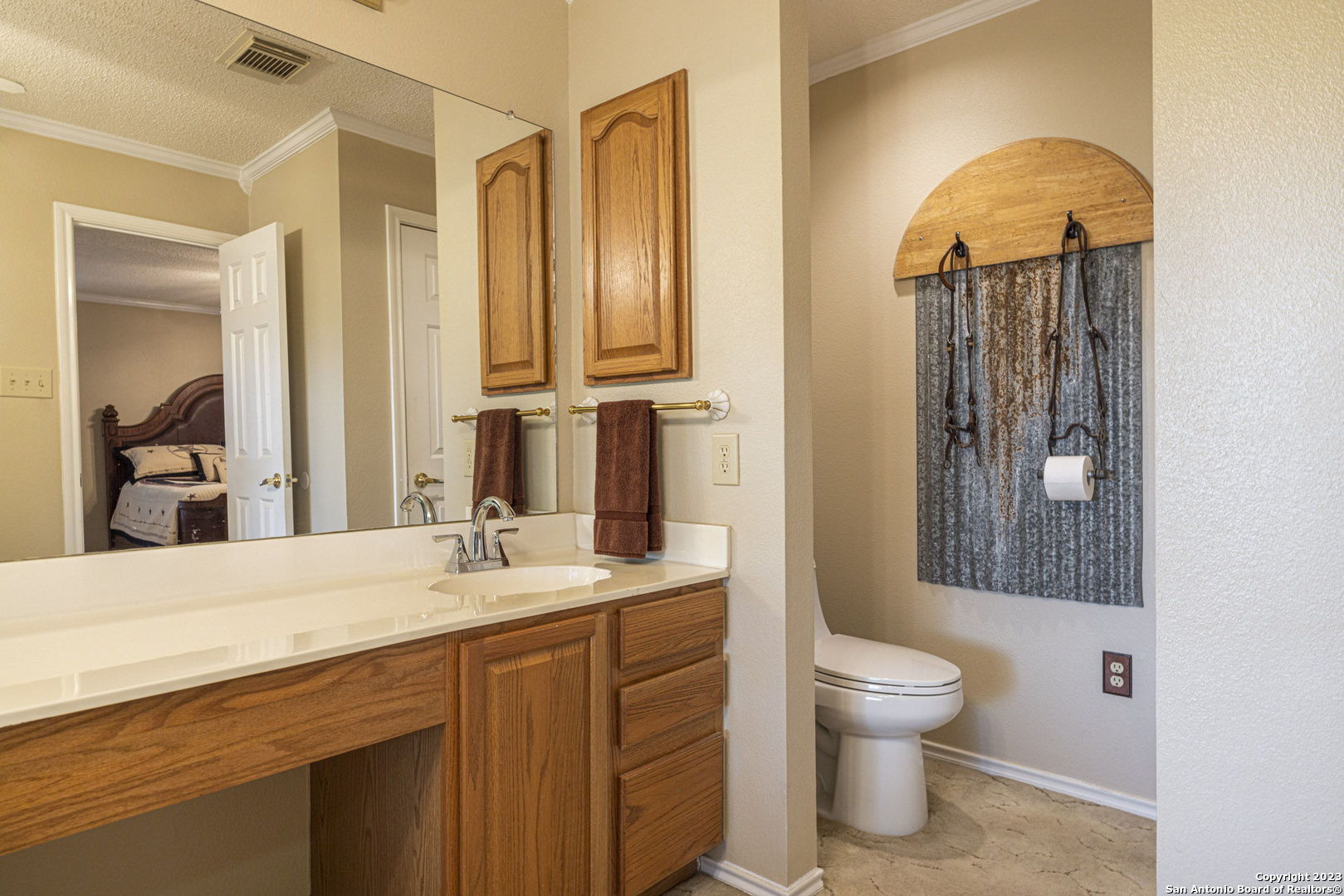 1940 Lower Seguin Road Marion, TX 78124 - Photo 22 of 49 a bathroom with a sink a toilet and mirror