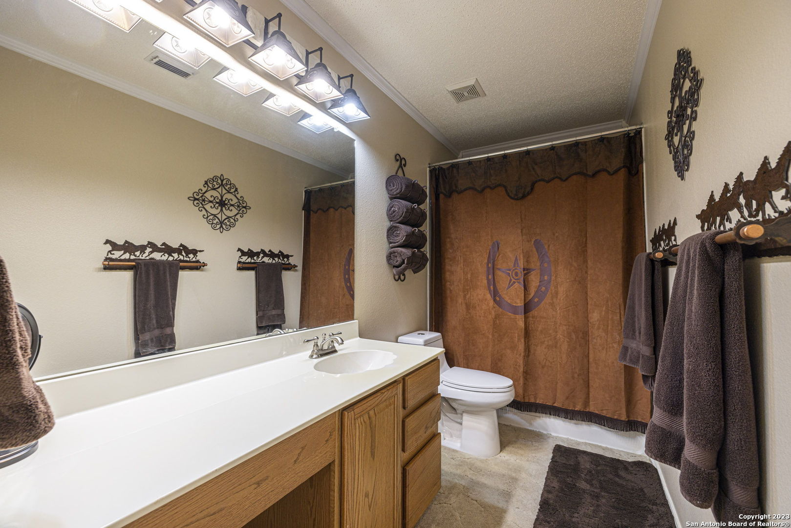 1940 Lower Seguin Road Marion, TX 78124 - Photo 25 of 49 a bathroom with a granite countertop sink toilet and shower