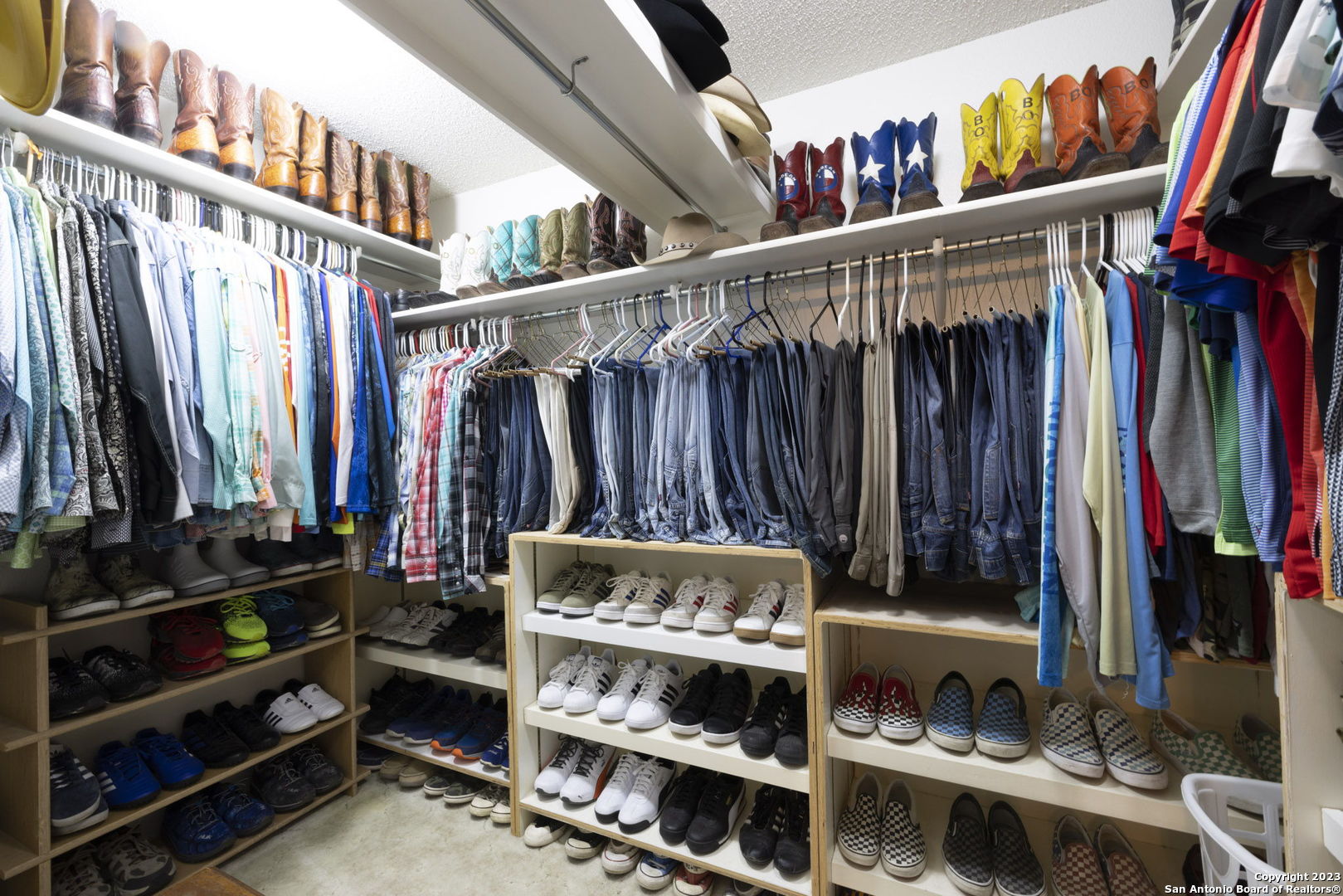 1940 Lower Seguin Road Marion, TX 78124 - Photo 26 of 49 a view of walk in closet with clothes and shoes