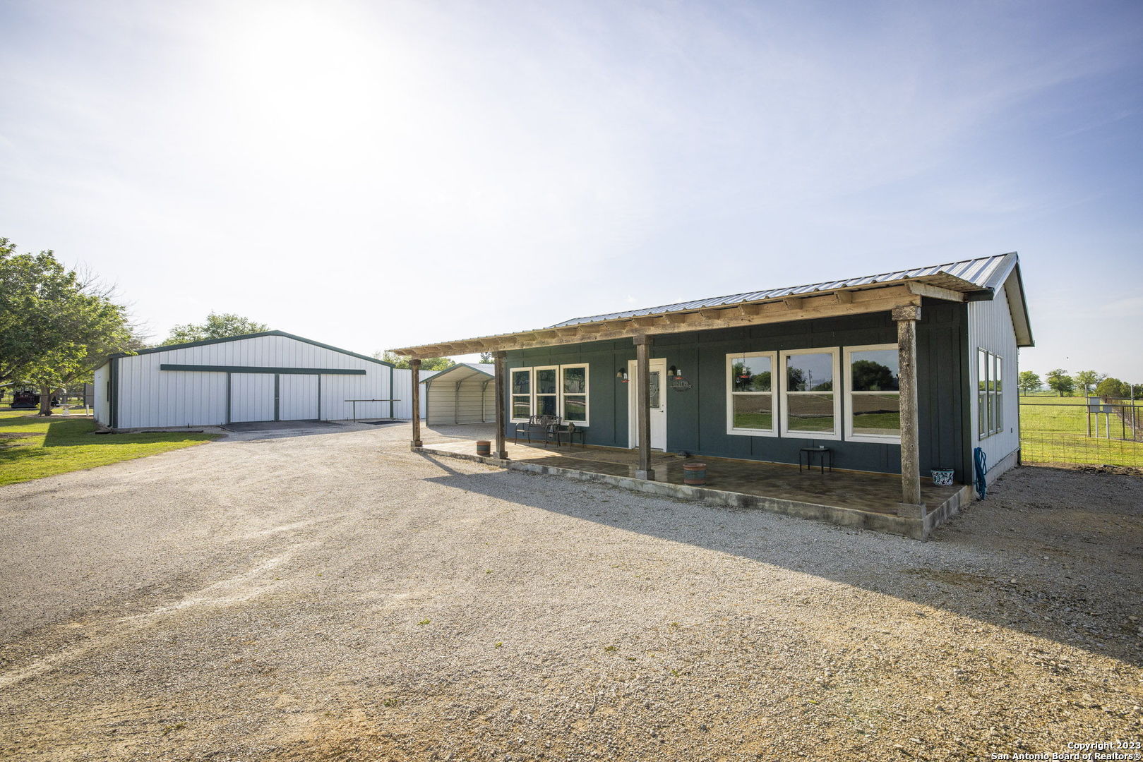 1940 Lower Seguin Road Marion, TX 78124 - Photo 30 of 49 a front view of a house with a yard and garage