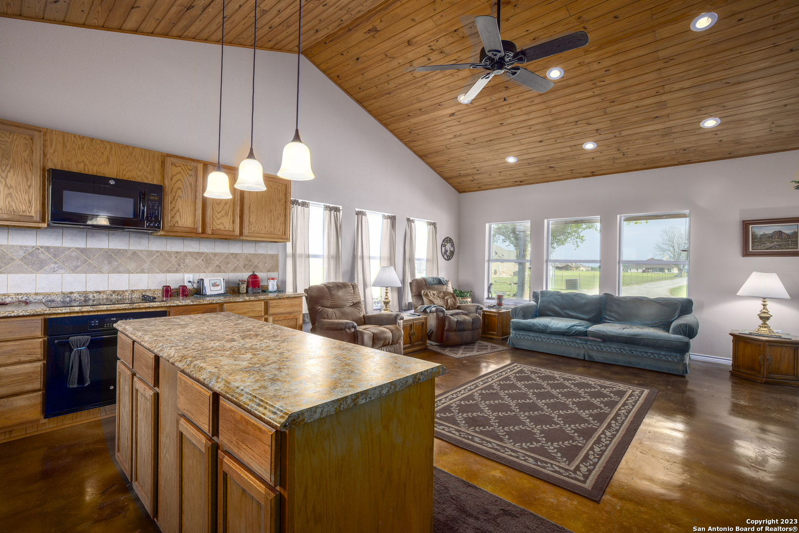 1940 Lower Seguin Road Marion, TX 78124 - Photo 35 of 49 a kitchen with a stove a sink and a microwave
