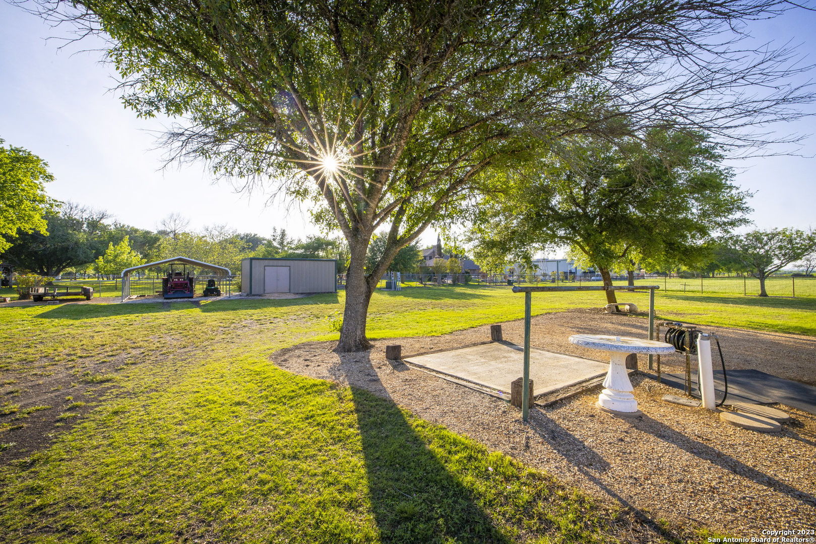 1940 Lower Seguin Road Marion, TX 78124 - Photo 47 of 49 a view of a swimming pool with a table and chairs