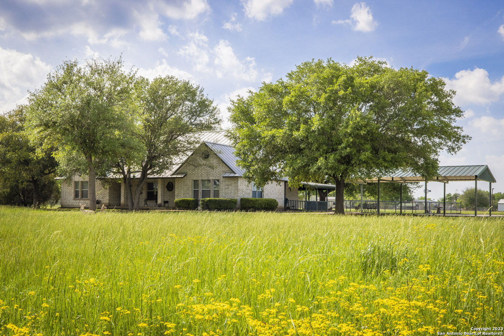 1940 Lower Seguin Road Marion, TX 78124 - Photo 7 of 49 a view of a house with swimming pool and a big yard